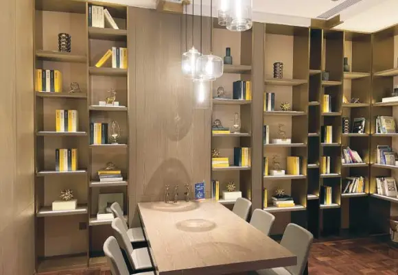 Decorative stainless steel cabinet integrated into an interior