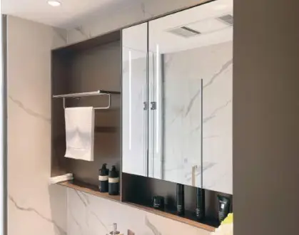 Stainless steel mirror frame in a bathroom interior